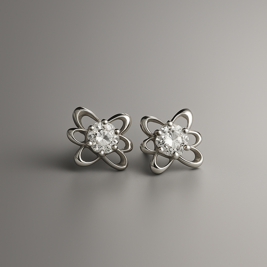 Pair of silver flower-shaped earrings with clear gemstones on a gray background